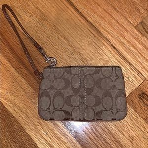Authentic small COACH wristlet/card holder. Used